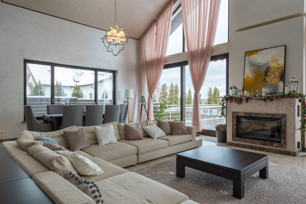 a luxury living room with neutral colors